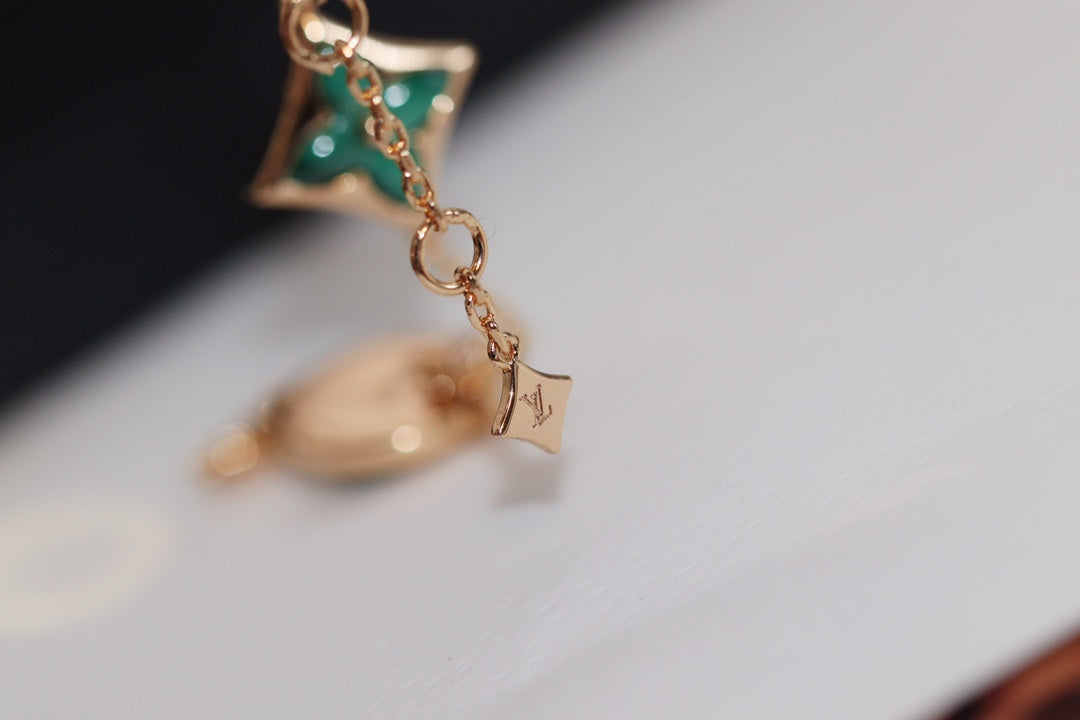 [LuckyStar]Armband aus Roségold mit Stern- und Sonnenmotiv und 4 Malachit-Motiven